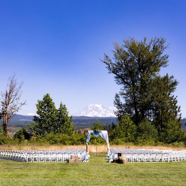 The Meadow: Chairs set facing the arbor