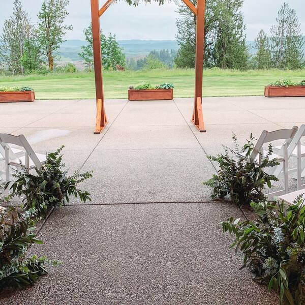 The Covered Patio: Aisle under the roof leading to the arbor