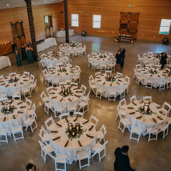 Overhead view of round tables with lantern centerpieces