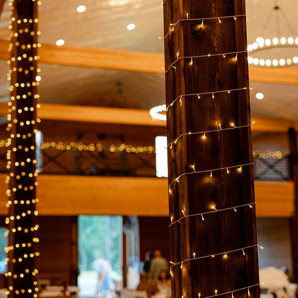 String-lit posts and the loft inside the barn