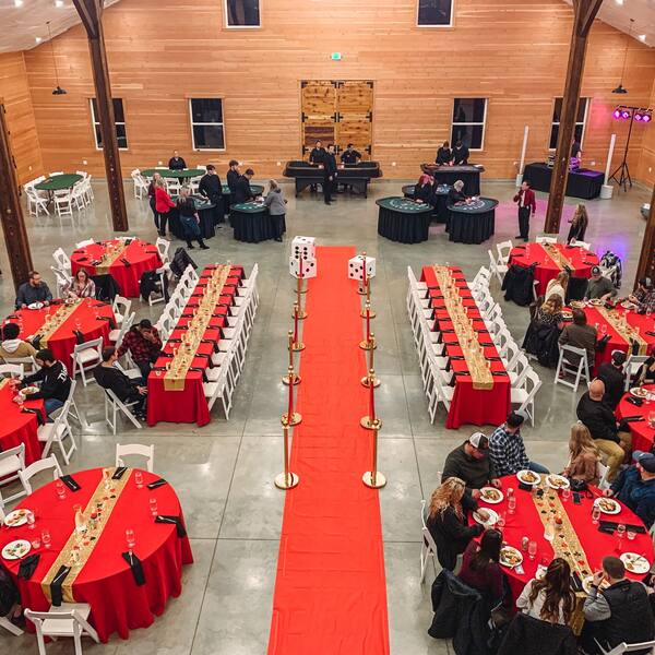 Casino-night holiday party: dinner beside the gaming tables