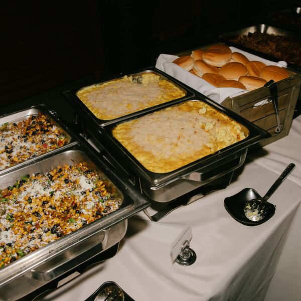 Buffet sides of mac and cheese and street corn salad