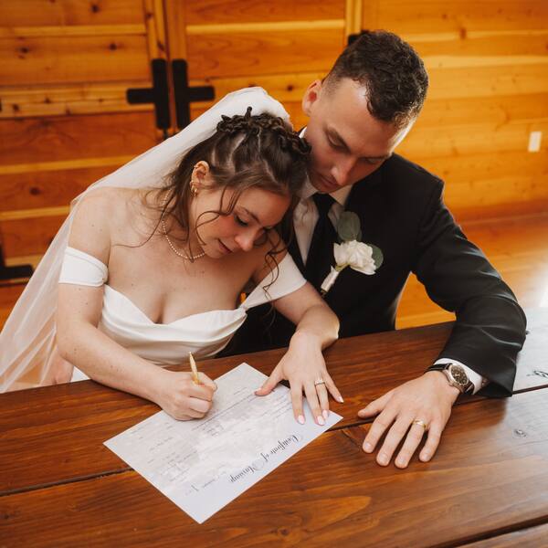 Signing the marriage license in the loft