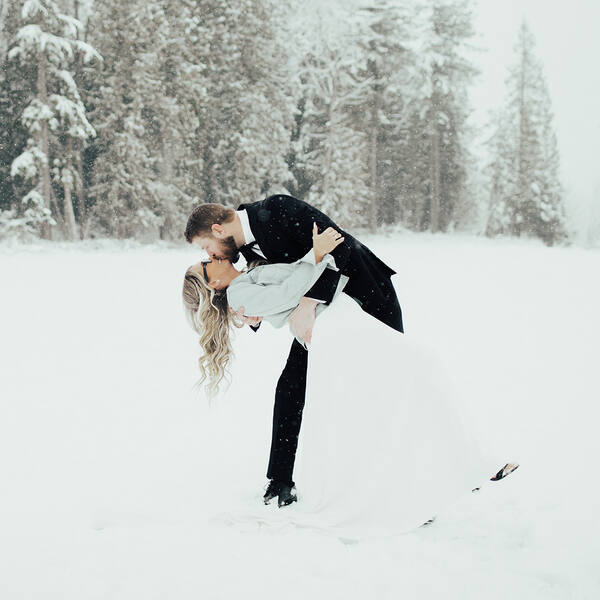 Couple in the snowy meadow