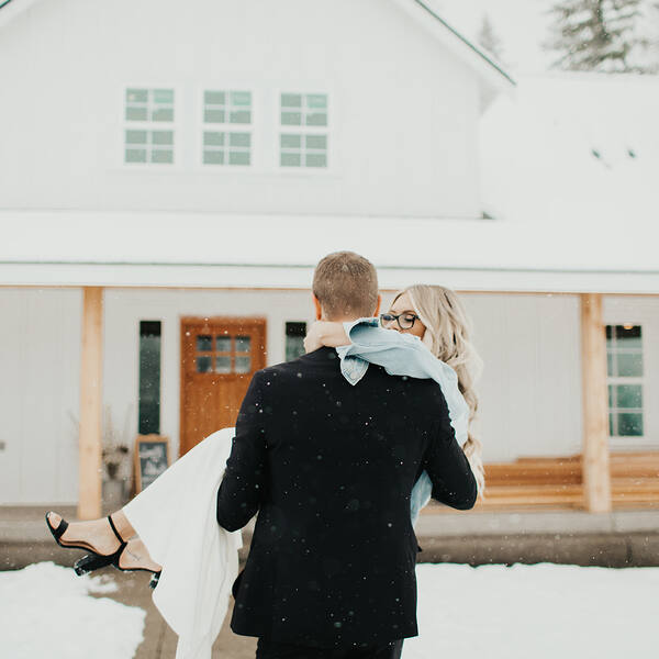 Carried to the snowy bridal cottage