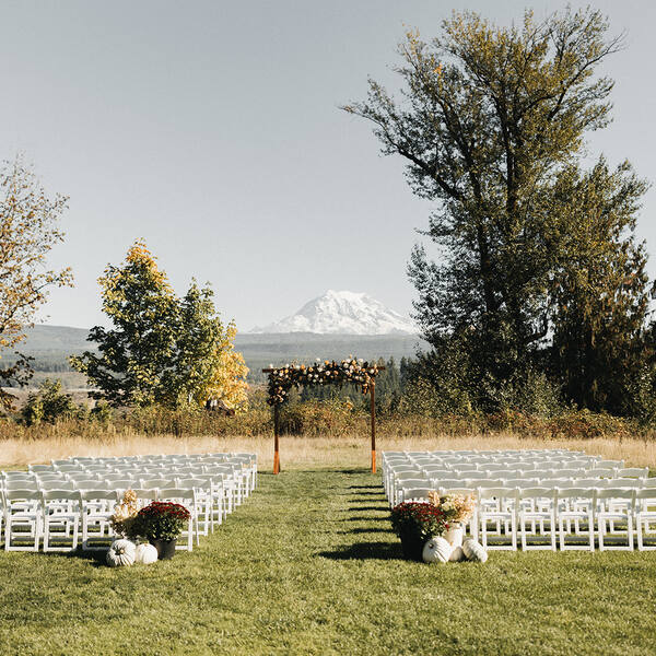 The Meadow: Fall setup with pumpkins and mums