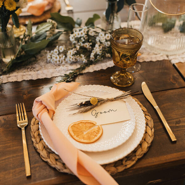 Fall place setting with dried orange