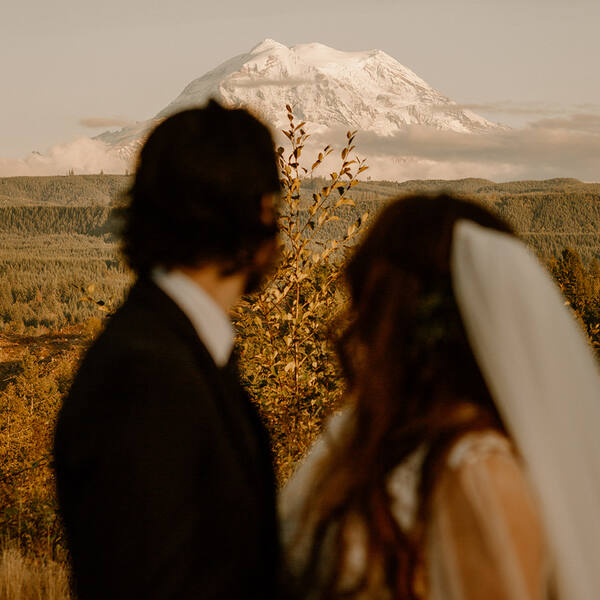 Couple looking out at Mount Rainier