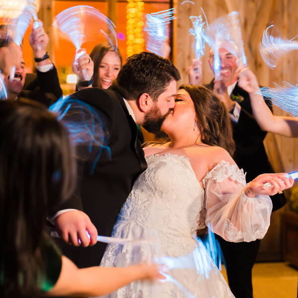 Kiss during a light-wand send-off