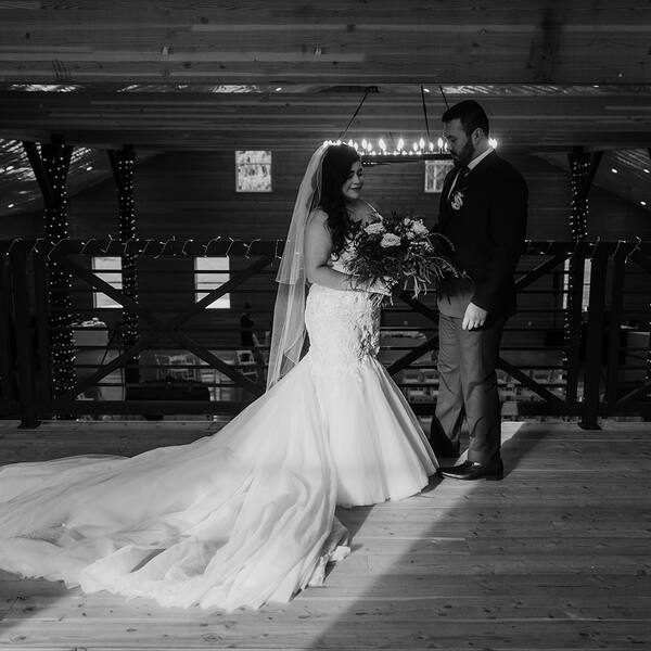 Couple in the loft above the barn floor