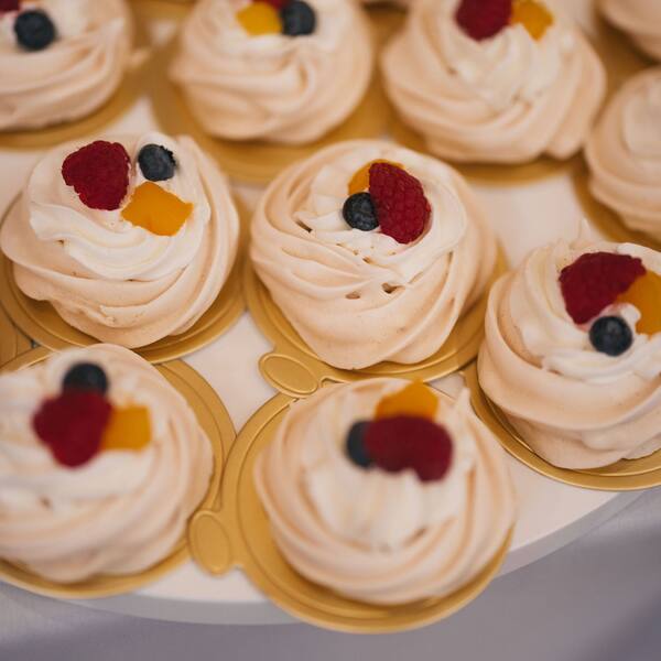 Mini pavlovas with fresh berries