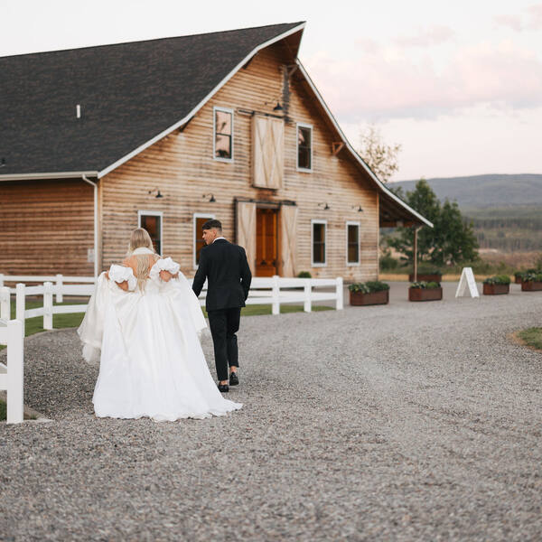 Walking up the gravel drive to the barn at dusk
