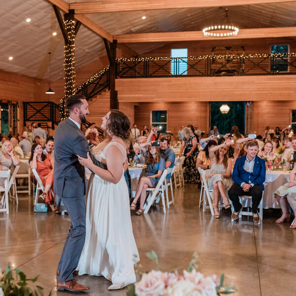 First dance with guests gathered under the loft